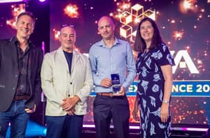 Whistl Fulfilment's Andy Couch poses with his Warehouse Leader award from UKWA. 