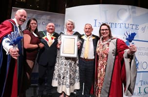 Whistl employee Louise O'Neil receives a Services to Industry award at the National Courier Awards