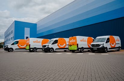 Whistl vans with smile icon at location