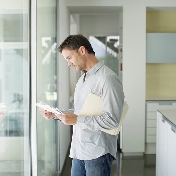 Customer reading mail