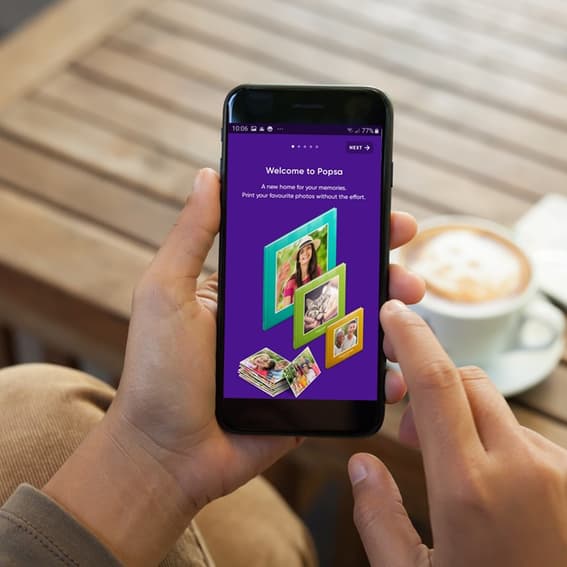 This is an image of the company Popsa mobile app. 